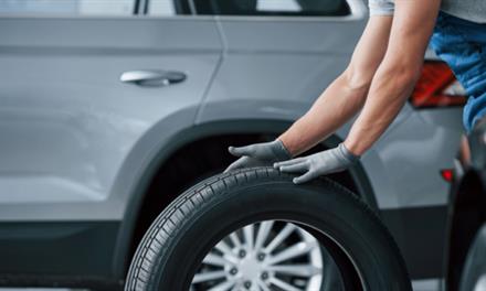 mechanic changing a tire